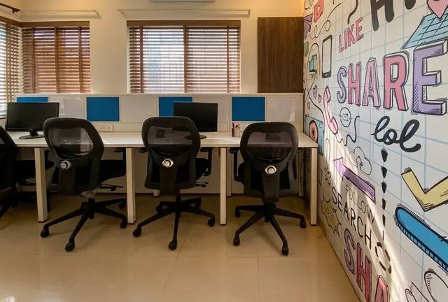 Workstations / Open Office, Minimalist style from Office Interior in Prabhat Road, Pune in Prabhat Road by Ar Mitalee Kulkarni
